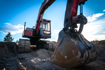 Heavy digger /  excavator / in construction site - wide angle photo