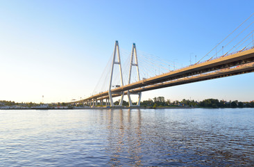 Fototapeta na wymiar Cable stayed bridge and Neva river.