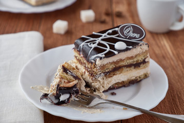 Delicious dessert cake with cream and   chocolate 