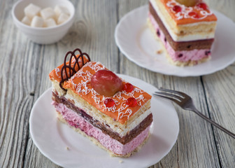 Delicious cake dessert with cream and fruit