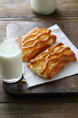 Glass of milk with buns