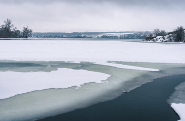 Seasonal landscape with frozen Dnepr river near Dnepropetrovsk city, Ukraine