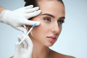 Beauty Care. Woman's Face Receiving Skin Lifting Injections