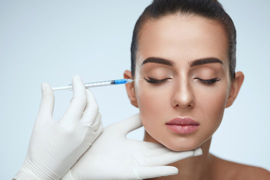 Cosmetic Treatment. Facial Skin Lifting Injection To Woman Face