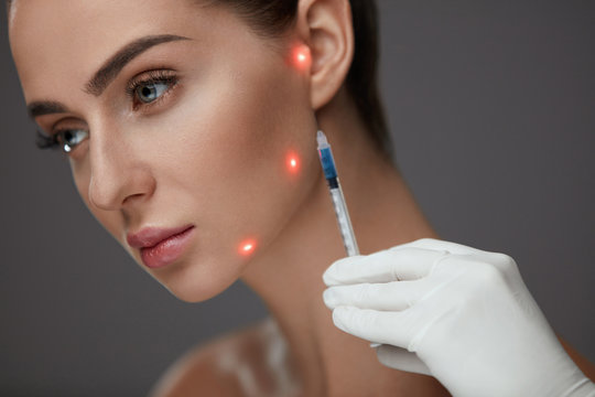Beauty Injection. Beautiful Girl Face With Laser Points On Skin