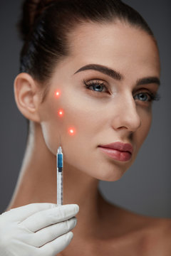 Beautiful Woman Receiving Facial Skin Lift Injections