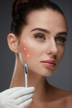 Beautiful Woman Receiving Facial Skin Lift Injections