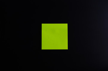 blank sticky note or post note colorful on blackboard.