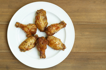 grilled chicken wings on white dish