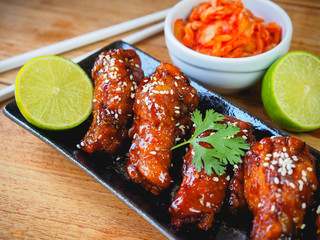 Spicy deep fried chicken wing korean style.