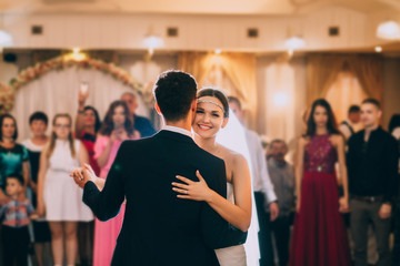 Newlywed couple first dance at ballroom