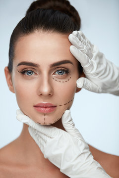 Young Female With Surgical Lines, Smooth Skin And Perfect Makeup
