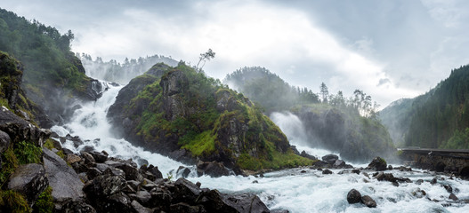 Landscape of Waterfall nearscandinavian road