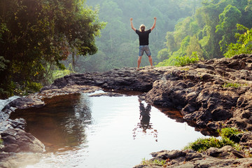 Obraz premium Winner on the mountain top. Active life concept