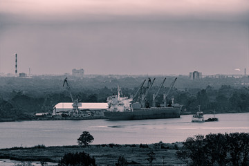Cargo ship (bulk carrier) loading in port at Riga, Latvia