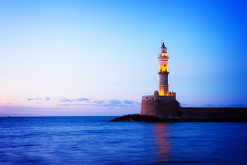 lighthouse of Chania at blue night, Crete, Greece, retro toned