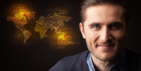 Portrait of a young businessman on dark background