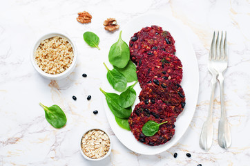 Black beans quinoa beet walnuts burgers with spinach