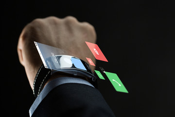 close up of businessman hand with smartwatch