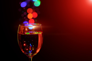 wine glasses with light bokeh background.