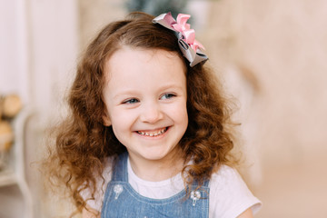 Portrait of cute litlle smiling girl