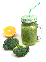 fresh fruit vegetable broccoli celery orange smoothie bottle shake isolated on white background