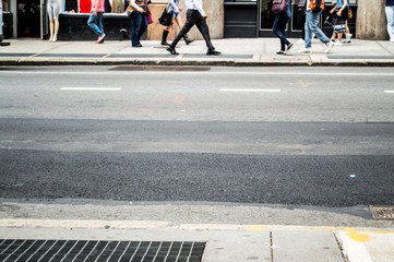 Crowds, People Walking the Streets of Manhattan in New York, USA