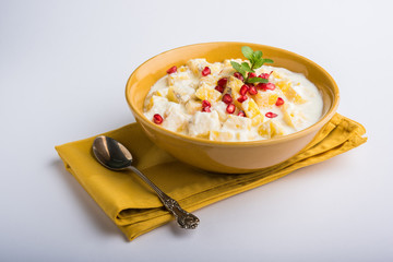 ananas or anaanaas or pineapple raita, chopped pieces of pineapple mixed with sweet curd and...