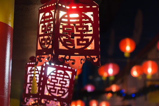 Traditional chinese paper lamps and globe lanterns at night