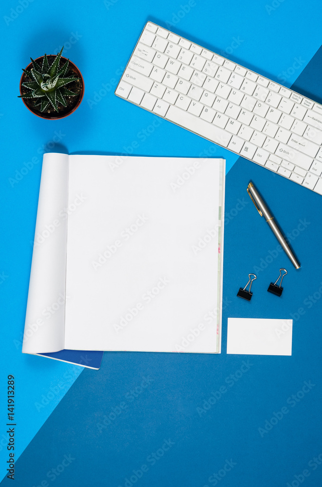 Poster mock-up magazine or catalog on colorful table. white page or notepad on modern background. blank cop