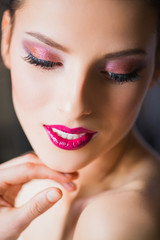 Photo of beautiful woman with makeup close up