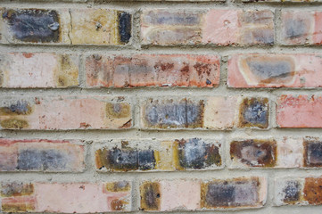 Texture of red bricks as background close up