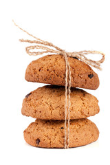 Oatmeal cookies with chocolate tied rope isolated on white background