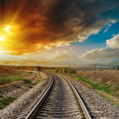 good orange sunset over railroad