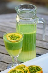 Green cocktail smoothie juice with kiwano horned melon