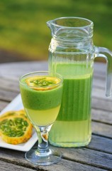 Green cocktail smoothie juice with kiwano horned melon