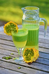 Green cocktail smoothie juice with kiwano horned melon