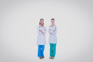 Two young woman doctor , standing in hospital