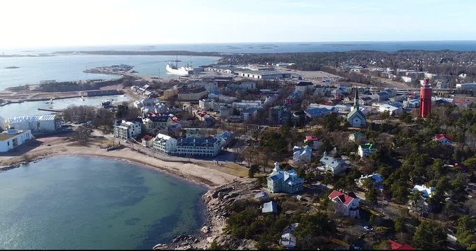 Hanko city, Cinema 4k aerial slow pan view of the city, towards ita- and lansi-satama, on a sunny spring day, in Hango, Finland