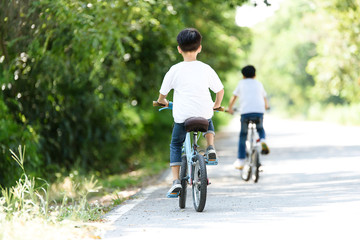 Young boy ride bicycle
