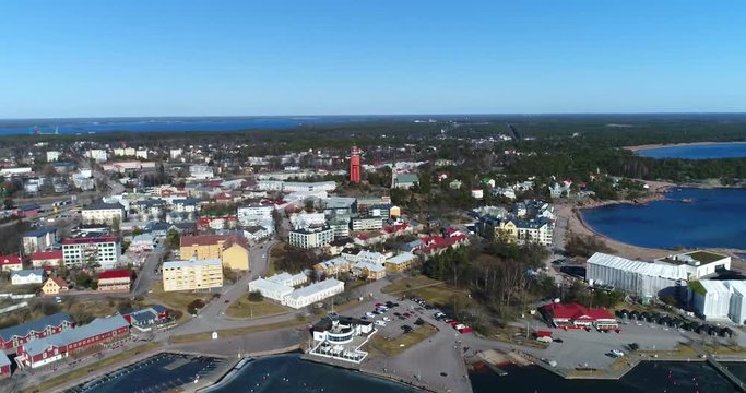 Hanko city, Cinema 4k aerial pan view of the city, from itasatama towards lansi-satama, on a sunny spring day, in Hango, Finland