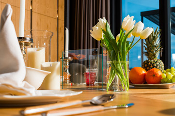 Served table and decorated with flowers