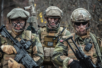 Norwegian Rapid reaction special forces FSK soldiers in field uniforms posing in the forest