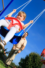 Family Playing In The Garden