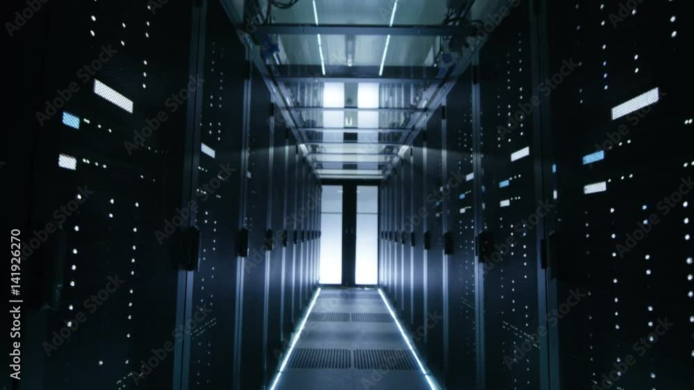 Poster descending camera shot of a working data center full of server racks. shot on red epic-w 8k helium c