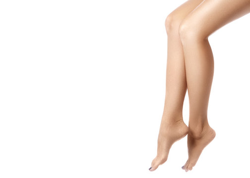 Female legs after depilation. Healthcare, foot care, rutine treatment. Spa and epilation. Feet with clean smooth skin.