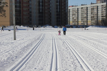 Young girl skiing on ski track 30354