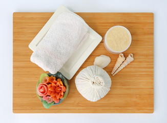 Spa herbal compressing ball with towels and Salt Scrub, Spa concept background