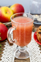 Juice from freshly squeezed fruit in tall glass.