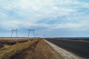 High voltage pole and road